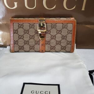 Gucci GG Logo Continental Canvas Tan Bifold Wallet with Leather Trim. 1462012778